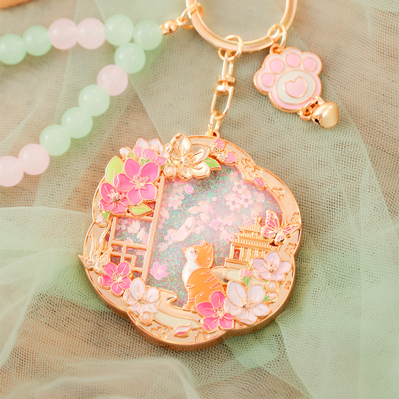 上新了故宫  喵戏花影流沙金属钥匙扣文创